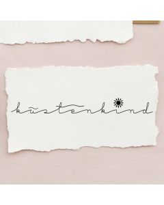 Holzstempel mit Abdruck: küstenkind  